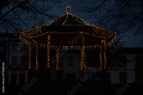 Bandstand decoreted  with christmas lights in the night photo