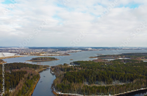 Aerial view of the forest lake. Landscape nature in winter