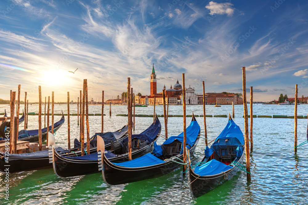 The island of San Giorgio Maggiore and traditional gondolas of Venice, Italy