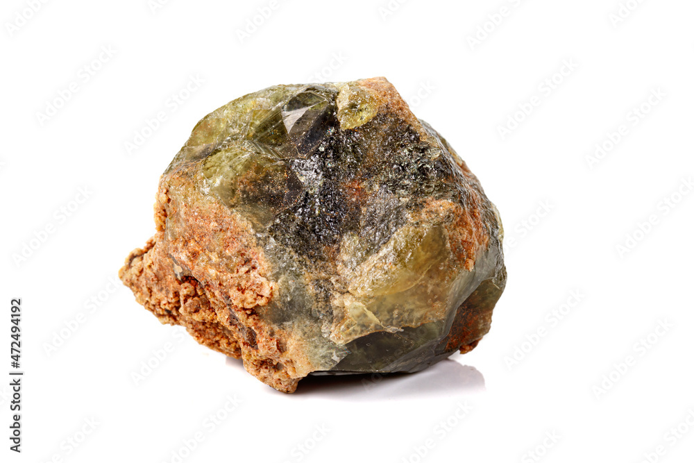 Macro stone Grossular mineral on white background Macro stone Grossular mineral on white background