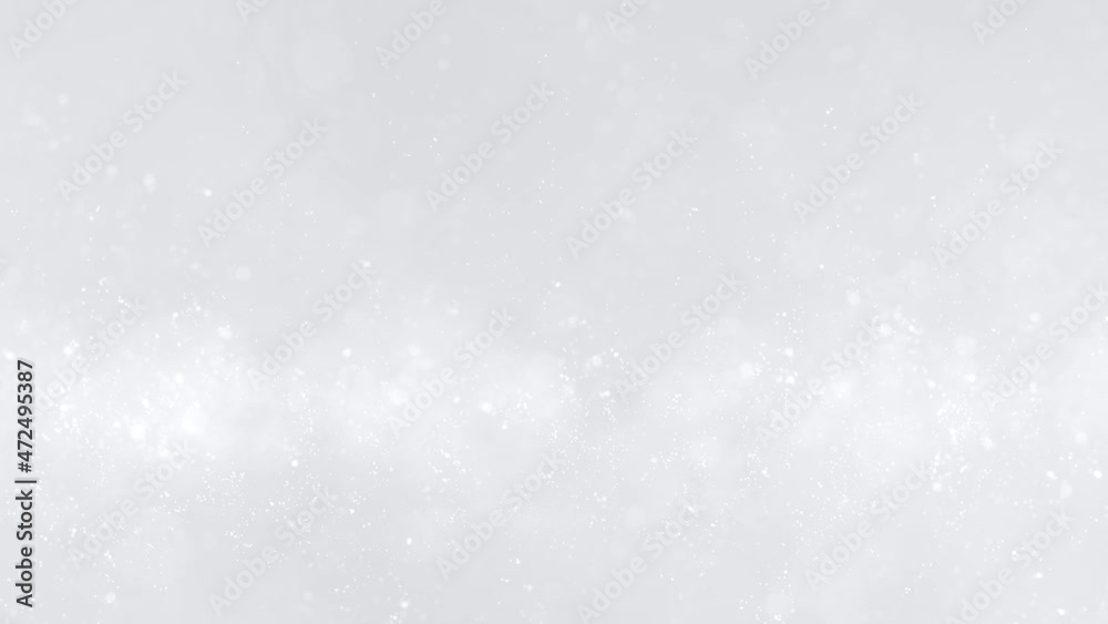 Bright silver white glitter sparkles particles glistering copy space bokeh background.