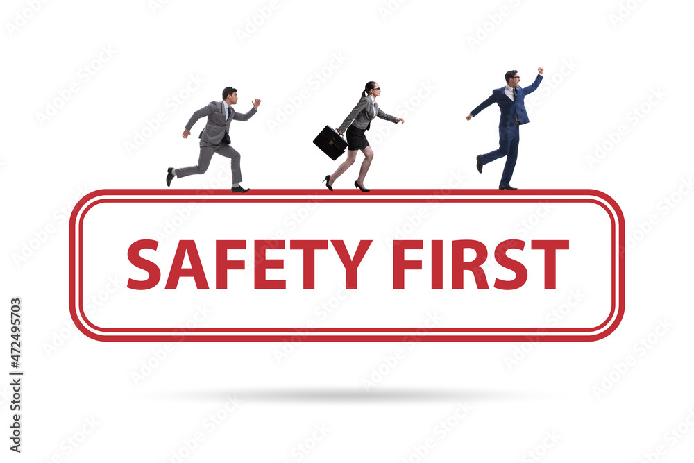 Safety first badge with business people Safety first badge with business people