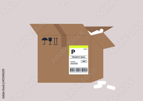 Delivery service, a cardboard crate with a priority bar code tag on it, and a box filler inside