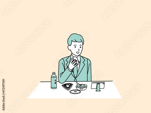 ランチを食べる　お昼ご飯　休憩　男性会社員　ビジネスマン　お弁当