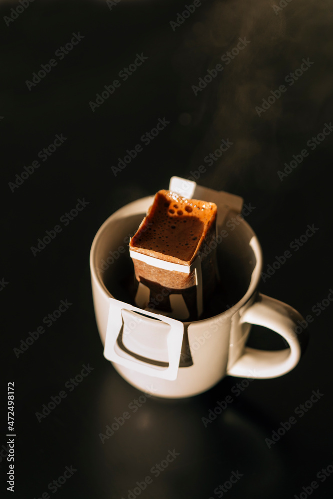 drip coffee bag in a mug , coffee concept Stock Photo Adobe Stock