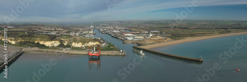 A Hopper dredger in Newhaven Bay before entering the port and the River Ouse. Aerial panoramic.