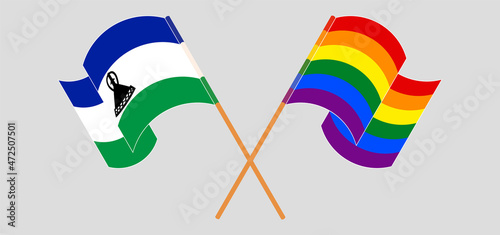 Crossed and waving flags of Kingdom of Lesotho and LGBTQ
