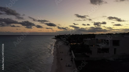 Paseo nocturno en drone desde costas de Playacar, Riviera Maya, México. photo