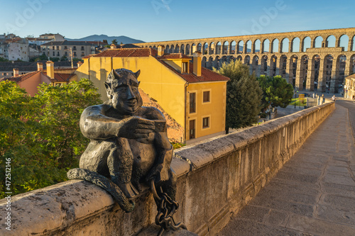 Devil and aqueduct in the city of Segovia in Spain. 