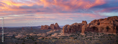 red rocks in arches national park with sunset
