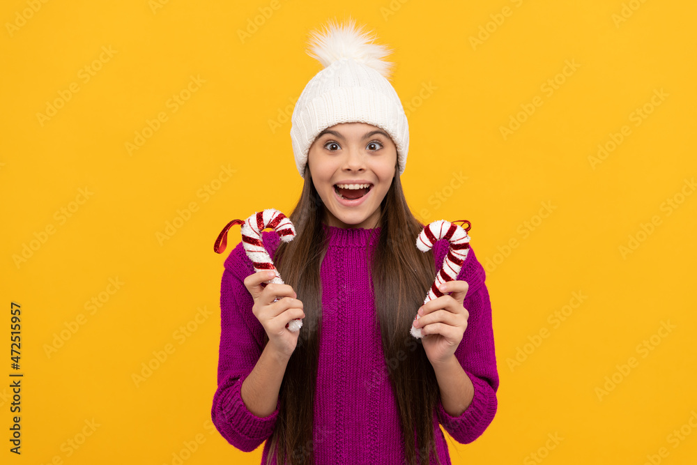 amazed teen girl wear hat hold candy stick, christmas amazed teen girl wear hat hold candy stick, christmas