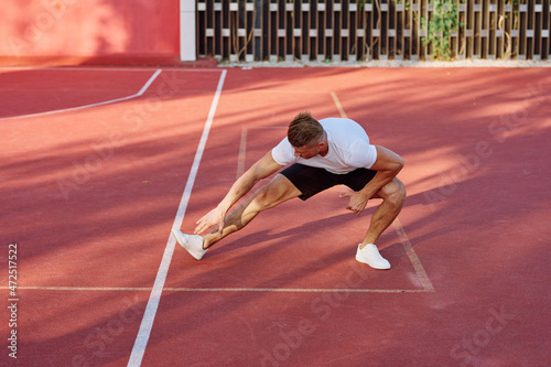 man on the sports ground exercise warm-up lifestyle