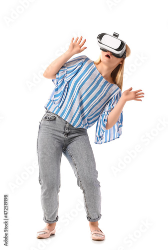 Young blonde woman in VR gl...