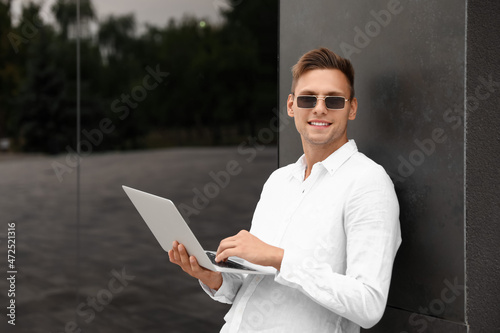 Handsome young man in sungl...