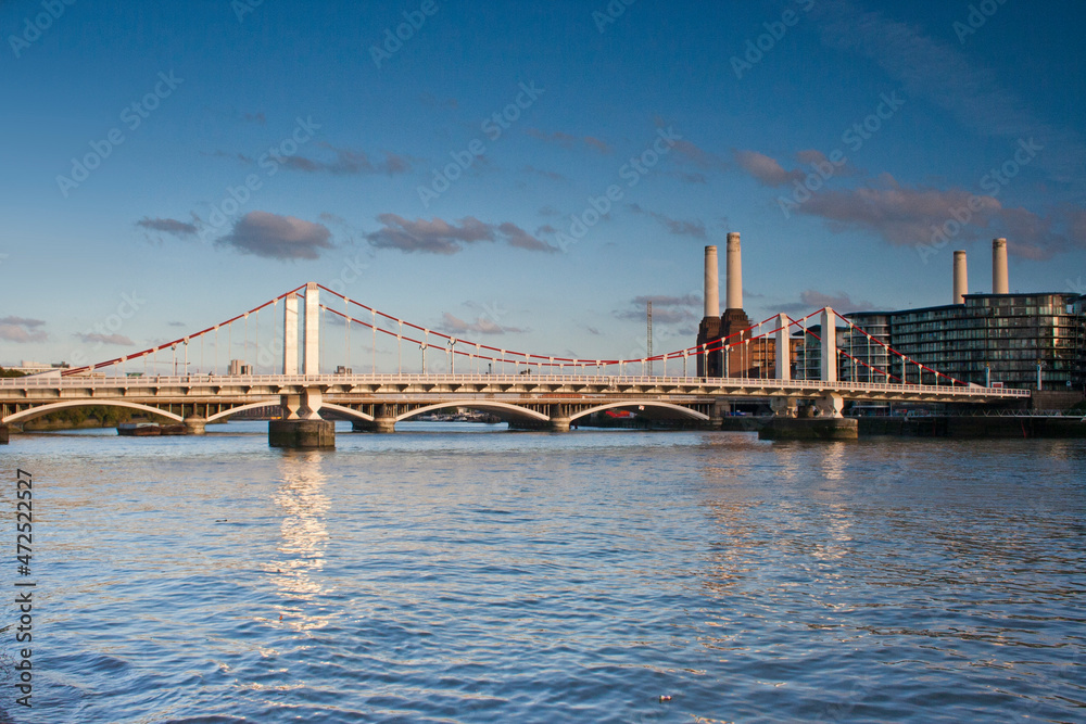 River Thames Grosvenor Rail Bridge and Battersea Power Station blue sky clouds