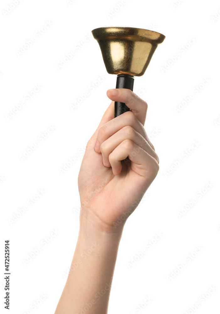 Female hand with golden Christmas bell on white background, closeup