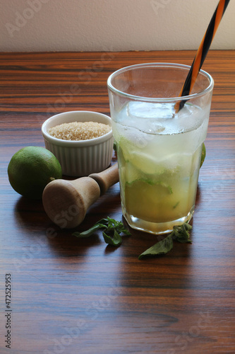 Brazilian drink. Caipirinha cocktail, traditional drink made with lemon, sugar and cachaça. photo