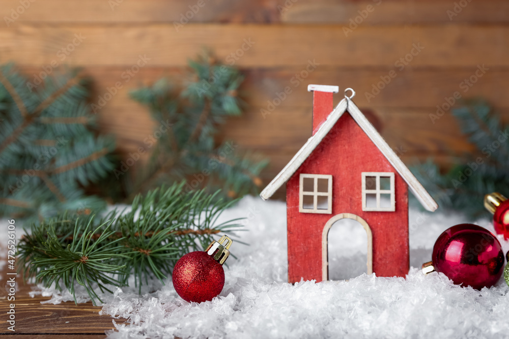 Beautiful Christmas composition with decorations,fir branches and snow on wooden background Beautiful Christmas composition with decorations,fir branches and snow on wooden background