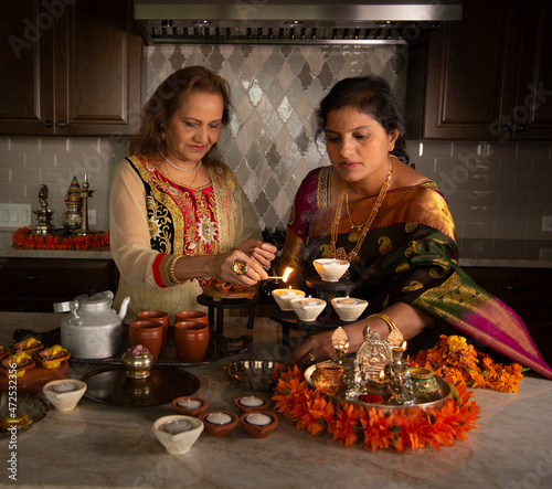 Women prepping for Diwali 