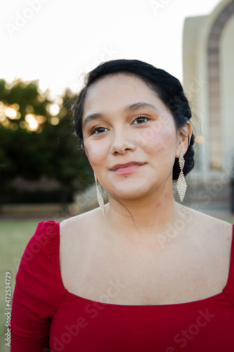 Hispanic Female in Red Dress Portrait at College