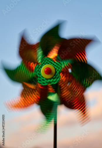 Spinning orange and green pinwheel
