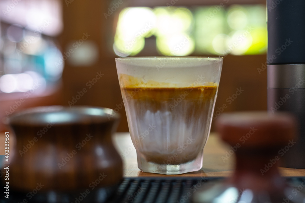 A Glass of coffee called Dirty Coffee, Coffee with milk A Glass of coffee called Dirty Coffee, Coffee with milk