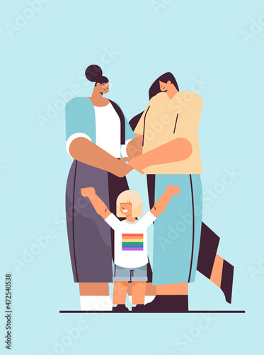 mix race female parents standing with little child lesbian family transgender love LGBT community concept