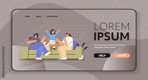 female parents playing with little child lesbian family transgender love LGBT community concept