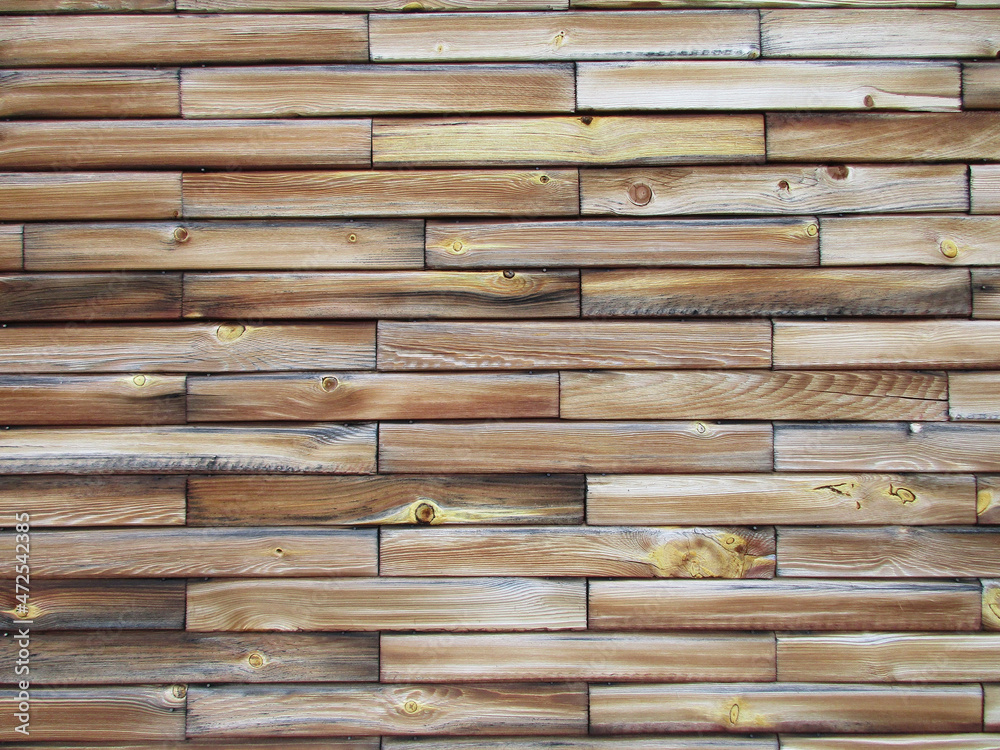 Stylized brick wooden wall with a clear relief, texture Stylized brick wooden wall with a clear relief, texture