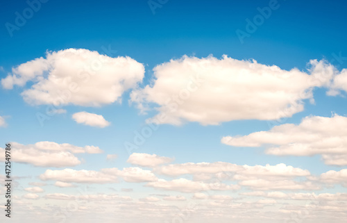 Blue sky with fluffy white clouds