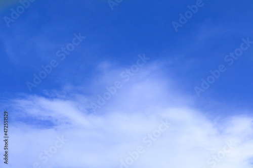 Blue sky texture and bright clouds in daylight