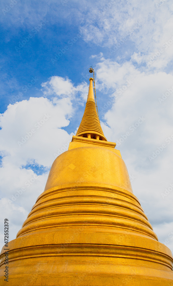 The golden Buddhist pagoda is a place of worship for teachings and peace in Thailand.