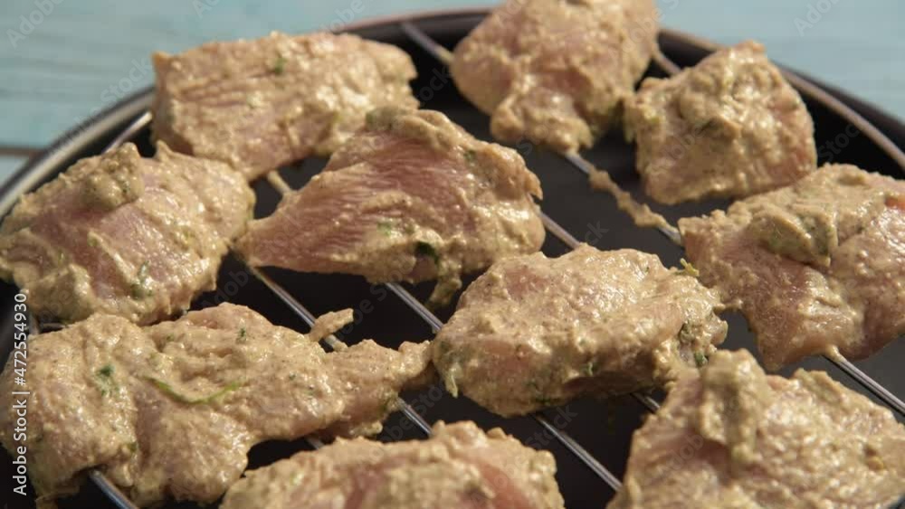 marinated chicken serving on a grill marinated chicken serving on a grill