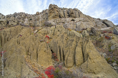 Fancy clay figures formed as a result of soil erosion photo