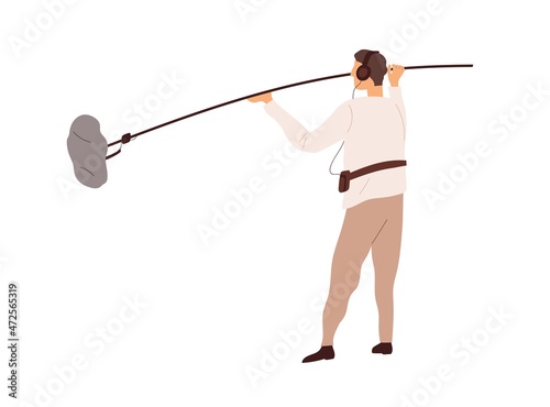 Boom operator with microphone on pole. Movie recordist holding fluffy mic, re...
