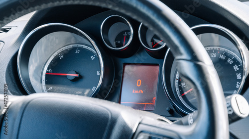 Speed background. Car dashboard panel with speedometer, tachometer. Fast vehicle, no limit concept. © Maksym