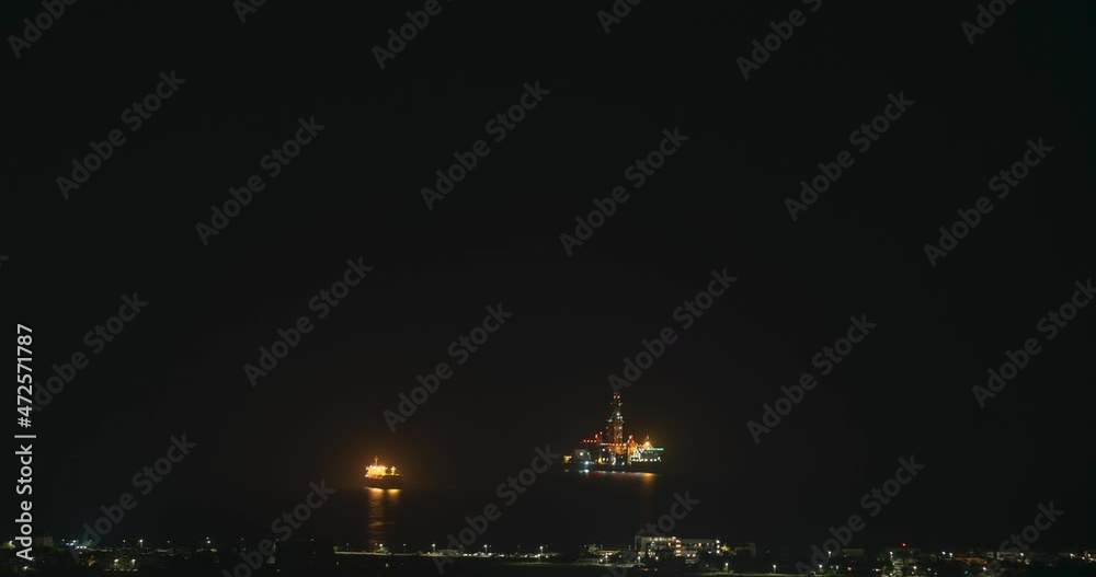 Timelapse video of the cargo and oil and gas ferries at night by the coast of Cyprus Island Timelapse video of the cargo and oil and gas ferries at night by the coast of Cyprus Island