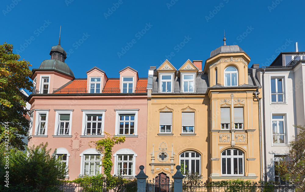 colorful historic house facades with turrets and gables, munich district Neuhausen