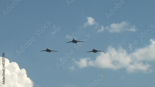 Zhukovsky, Russia, August 10, 2012 Tupolev Tu-160M ​​(NATO codification: Blackjack). Close-up. Flight of three supersonic strategic bomber Tu-160M ​​with variable wingspan.
 photo