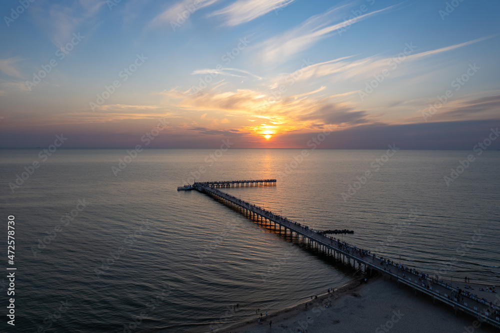 Aerial summer sunset view of sunny resort Palanga, Lithuania. Baltic sea, Palanga Bridge - Pier