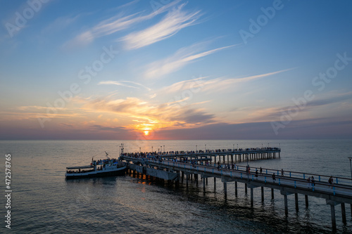 Aerial summer sunset view of sunny resort Palanga, Lithuania. Baltic sea, Palanga Bridge - Pier