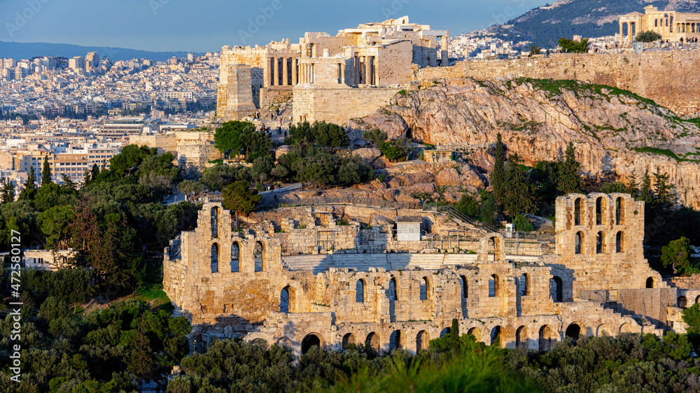 Acropolis and Odeon of Herodes Atticus. Panorama as seen from the Filopappou Hill at sunset. Athens, Greece
