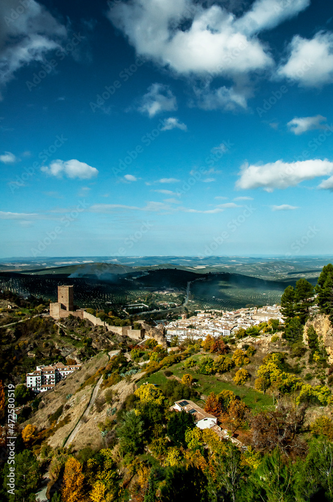 Cazorla autumn scene. Andalusian town in Jaen. Autumn colors with blue sky and small clouds.