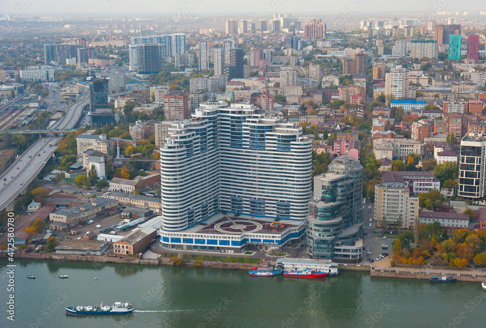 Fototapeta premium White Angel residential complex and Riverside-Don business center. View from the plane. Rostov-on-Don, October 18, 2021. 