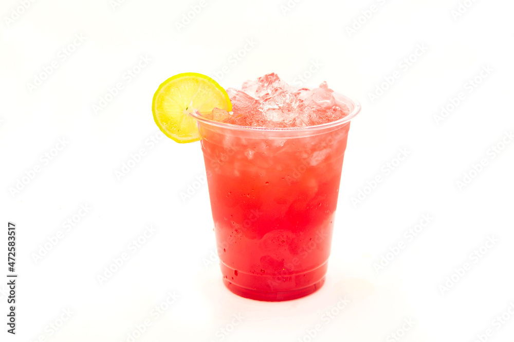 Strawberry iced drink with lemon slice served in to go cup. Strawberry iced drink with lemon slice served in to go cup.