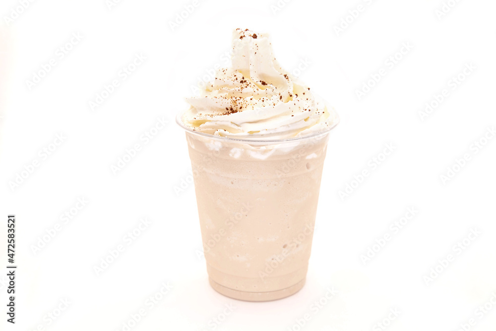 Vanilla coffee frappe with whipped cream and crushed coffee bean grains. Vanilla coffee frappe with whipped cream and crushed coffee bean grains.
