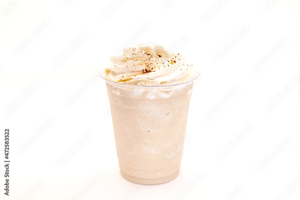 Classic frappe with whipped cream and coffee grains sprinkled on top. Classic frappe with whipped cream and coffee grains sprinkled on top.