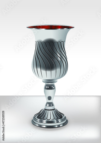 A silver trophy filled with wine in honor of the holiday or Shabbat