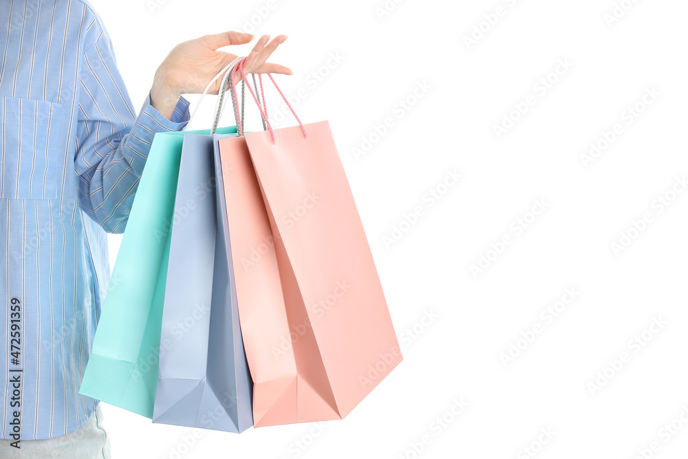 Woman with shop bags isolated on white background