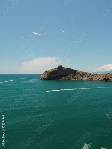 AT THE JUNCTION OF THE MOUNTAINS AND THE SEA